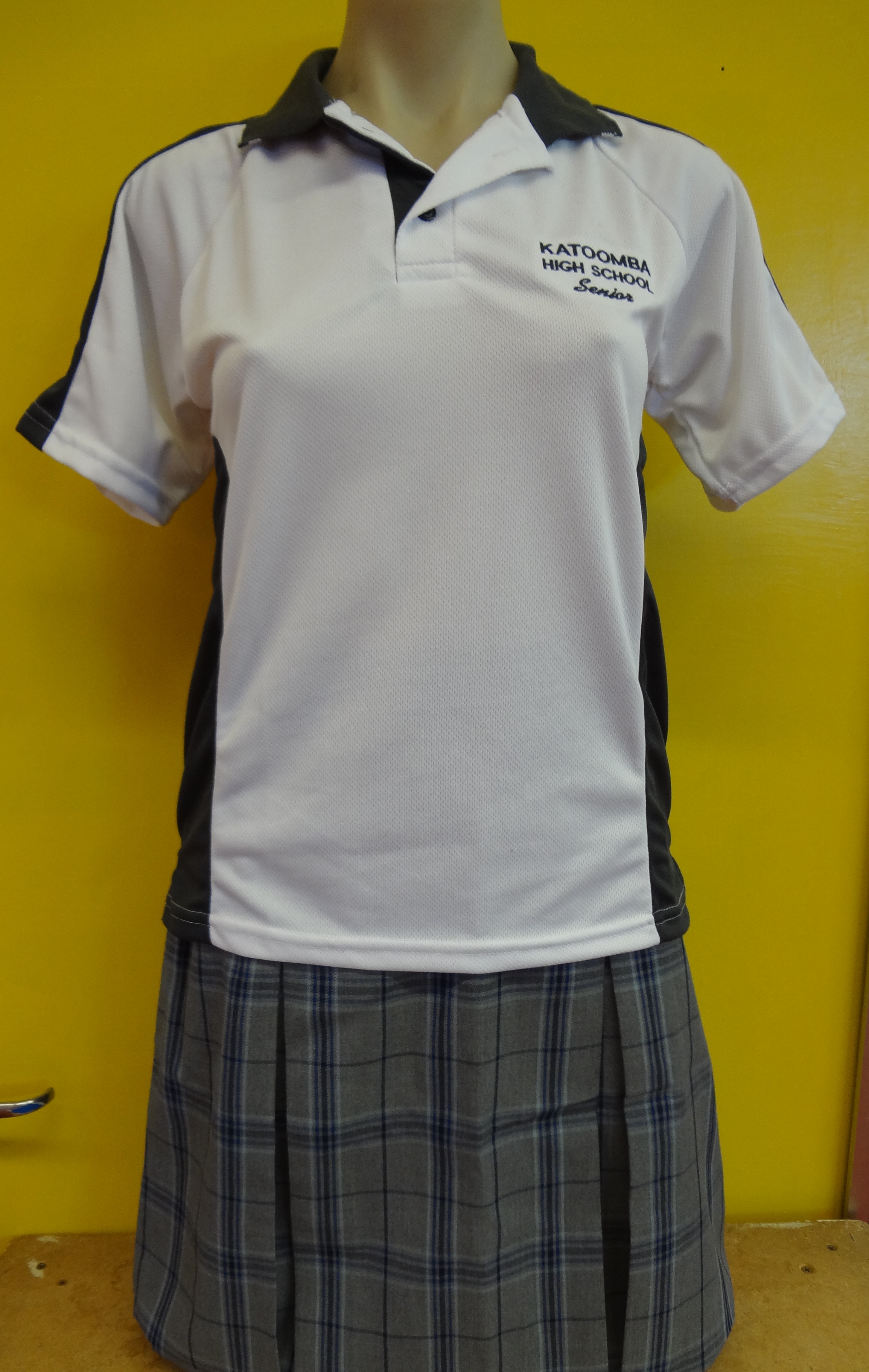 Senior unisex polo shirt and skirt